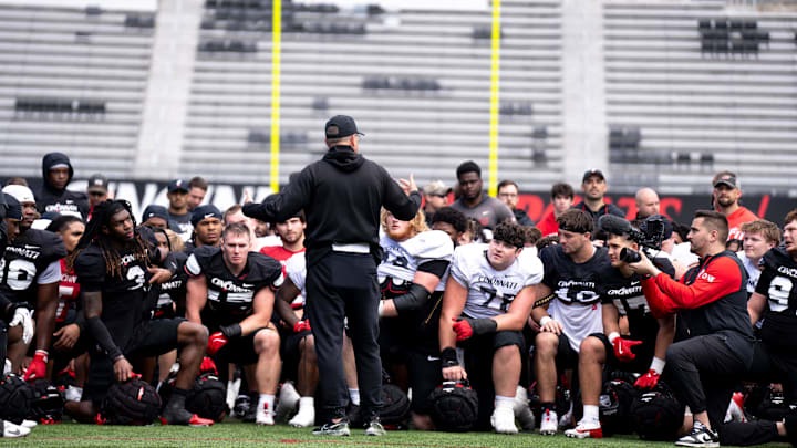 Cincinnati Bearcats head coach Scott Satterfield speaks to the team during the Cincinnati Bearcats football spring practice at Nippert Stadium on Saturday, April 12, 2025. Cincinnati Bearcats head coach Scott Satterfield speaks to the team during the Cincinnati Bearcats football spring practice at Nippert Stadium on Saturday, April 12, 2025.