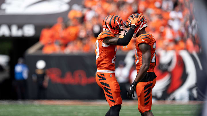 Cincinnati Bengals cornerback Cam Taylor-Britt (29) and Cincinnati Bengals cornerback Dax Hill (23) react after the Cincinnati Bengals forced a three and out in the first quarter of the NFL game at Paycor Stadium in Cincinnati on Sunday, Sept. 8, 2024. Cincinnati Bengals cornerback Cam Taylor-Britt (29) and Cincinnati Bengals cornerback Dax Hill (23) react after the Cincinnati Bengals forced a three and out in the first quarter of the NFL game at Paycor Stadium in Cincinnati on Sunday, Sept. 8, 2024.