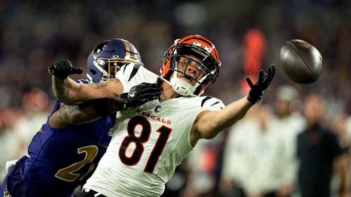 Cincinnati Bengals wide receiver Jermaine Burton (81) drops a pass as Baltimore Ravens defensive back Brandon Stephens (21) guards him in the fourth quarter of the NFL game at M&T Banks Stadium in Baltimore on Thursday, Nov. 7, 2024.