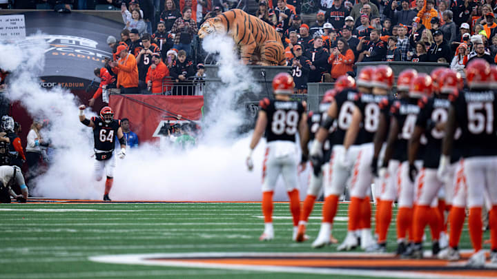 Cincinnati Bengals center Ted Karras (64) takes the field before the NFL game between the Cincinnati Bengals and the Denver Broncos at Paycor Stadium in Cincinnati on Saturday, Dec. 28, 2024. Cincinnati Bengals center Ted Karras (64) takes the field before the NFL game between the Cincinnati Bengals and the Denver Broncos at Paycor Stadium in Cincinnati on Saturday, Dec. 28, 2024.