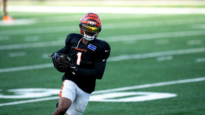 Cincinnati Bengals wide receiver Ja'Marr Chase (1) runs with the ball during Bengals Camp practice at Paycor Stadium in Cincinnati on Aug. 2, 2025.