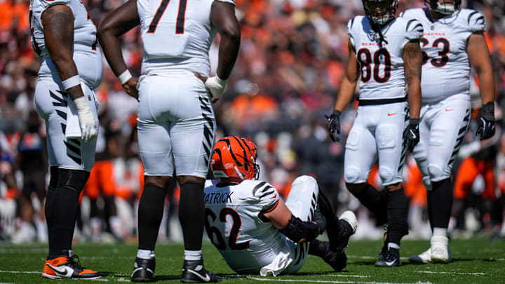 Cincinnati Bengals guard Lucas Patrick (62) goes down injured in the second quarter of the NFL Week 1 game between the Cleveland Browns and the Cincinnati Bengals at Huntington Bank Field in Cleveland on Sunday, Sept. 7, 2025. Cincinnati Bengals guard Lucas Patrick (62) goes down injured in the second quarter of the NFL Week 1 game between the Cleveland Browns and the Cincinnati Bengals at Huntington Bank Field in Cleveland on Sunday, Sept. 7, 2025.