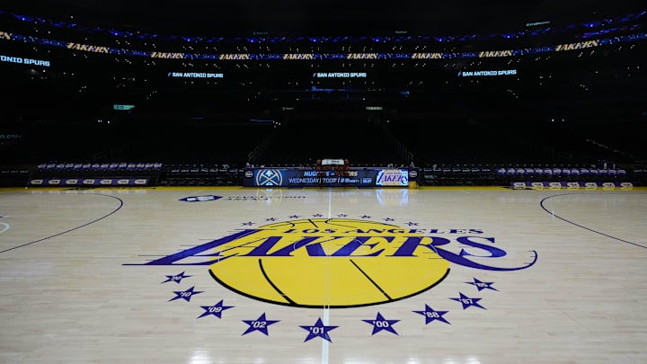 Mar 17, 2025; Los Angeles, California, USA; The Los Angeles Lakers logo at midcourt at Crypto.com Arena. Mandatory Credit: Kirby Lee-Imagn Images Mar 17, 2025; Los Angeles, California, USA; The Los Angeles Lakers logo at midcourt at Crypto.com Arena. Mandatory Credit: Kirby Lee-Imagn Images