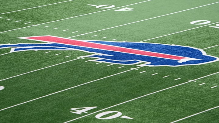 The Buffalo Bills logo at midfield at a 2024 AFC wild card game at Highmark Stadium.