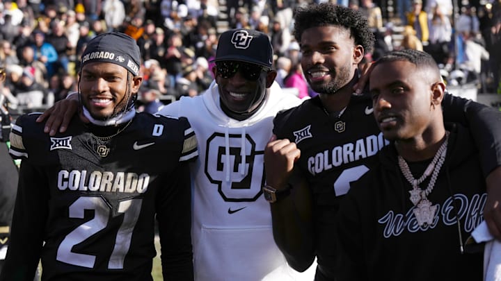 Nov 29, 2024; Boulder, Colorado, USA; Colorado Buffaloes safety Shilo Sanders (21) and head coach Deion Sanders and quarterback Shedeur Sanders (2) and social media producer Deion Sanders Jr. following the win against the Oklahoma State Cowboys at Folsom Field. Nov 29, 2024; Boulder, Colorado, USA; Colorado Buffaloes safety Shilo Sanders (21) and head coach Deion Sanders and quarterback Shedeur Sanders (2) and social media producer Deion Sanders Jr. following the win against the Oklahoma State Cowboys at Folsom Field.