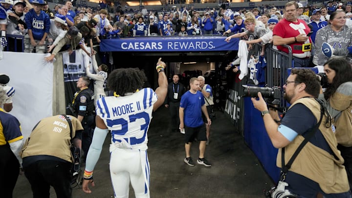 Dec 22, 2024; Indianapolis, Indiana, USA; Indianapolis Colts cornerback Kenny Moore II (23) points to the fans as he leaves the field after winning a game against the Tennessee Titans  at Lucas Oil Stadium. Mandatory Credit: Grace Hollars/USA Today Network via Imagn Images 