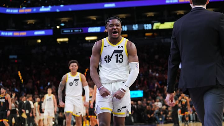 Feb 7, 2025; Phoenix, Arizona, USA; Utah Jazz guard Isaiah Collier (13) celebrates against the Phoenix Suns during the second half at Footprint Center. Mandatory Credit: Joe Camporeale-Imagn Images