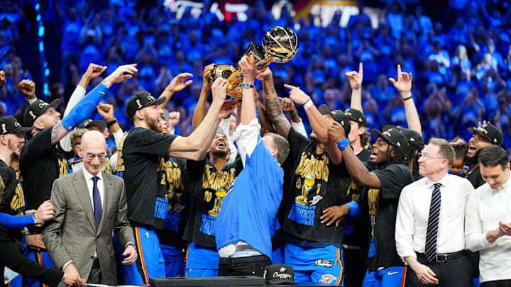 Jun 22, 2025; Oklahoma City, Oklahoma, USA; The Oklahoma City Thunder lift the Larry O'Brien Championship Trophy as they celebrate after winning game seven of the 2025 NBA Finals against the Indiana Pacers at Paycom Center. Mandatory Credit: Kyle Terada-Imagn Images