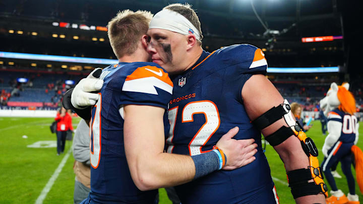 Dec 2, 2024; Denver, Colorado, USA; Denver Broncos offensive tackle Garett Bolles (72) hugs quarterback Bo Nix (10) following the win against the Cleveland Browns at Empower Field at Mile High. Dec 2, 2024; Denver, Colorado, USA; Denver Broncos offensive tackle Garett Bolles (72) hugs quarterback Bo Nix (10) following the win against the Cleveland Browns at Empower Field at Mile High.