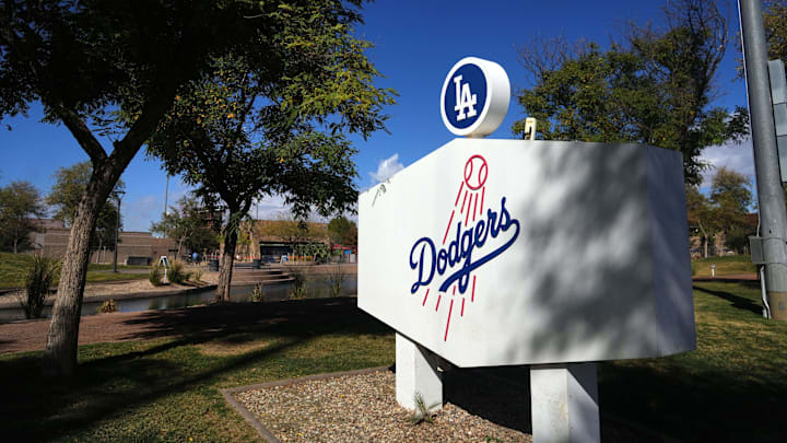 Feb 14, 2025; Glendale, AZ, USA; Los Angeles Dodgers logo signage on display during a Spring Training workout at Camelback Ranch. Mandatory Credit: Joe Camporeale-Imagn Images Feb 14, 2025; Glendale, AZ, USA; Los Angeles Dodgers logo signage on display during a Spring Training workout at Camelback Ranch. Mandatory Credit: Joe Camporeale-Imagn Images