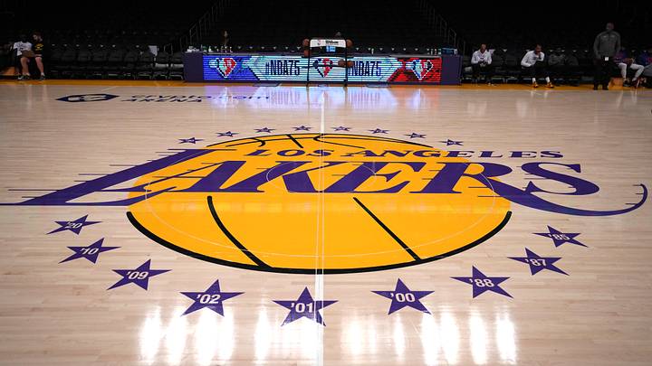 The Los Angeles Lakers logo at center court before the game between Philadelphia 76ers and Los Angeles Lakers at Crypto.com Arena. Mandatory Credit: Kirby Lee-USA TODAY Sports