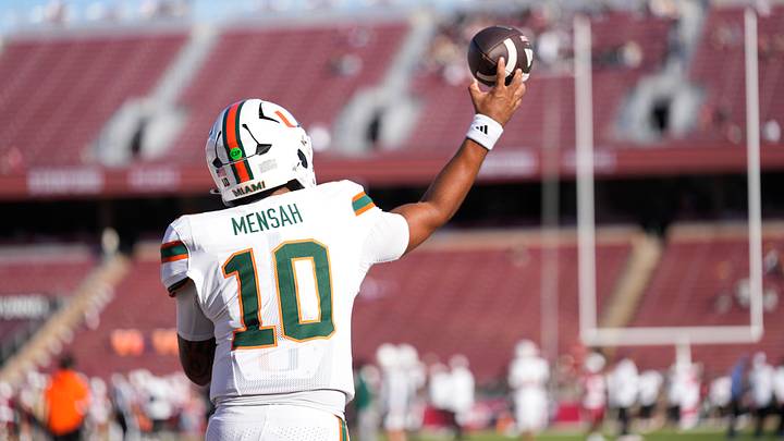 Sep 4, 2026; Stanford, California, USA;  Miami Hurricanes quarterback Darian Mensah (10) warms up prior to a game against the Stanford Cardinal at Stanford Stadium.  Mandatory Credit: Stan Szeto-Imagn Images