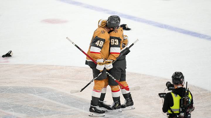 Jun 6, 2026; Las Vegas, Nevada, USA; Vegas Golden Knights right wing Mitch Marner (93) celebrates with center Tomas Hertl (48) after scoring his third goal against the Carolina Hurricanes as hats scatter on the ice during the second period in game three of the 2026 Stanley Cup Final at T-Mobile Arena. Mandatory Credit: Lucas Peltier-Imagn Images Jun 6, 2026; Las Vegas, Nevada, USA; Vegas Golden Knights right wing Mitch Marner (93) celebrates with center Tomas Hertl (48) after scoring his third goal against the Carolina Hurricanes as hats scatter on the ice during the second period in game three of the 2026 Stanley Cup Final at T-Mobile Arena. Mandatory Credit: Lucas Peltier-Imagn Images