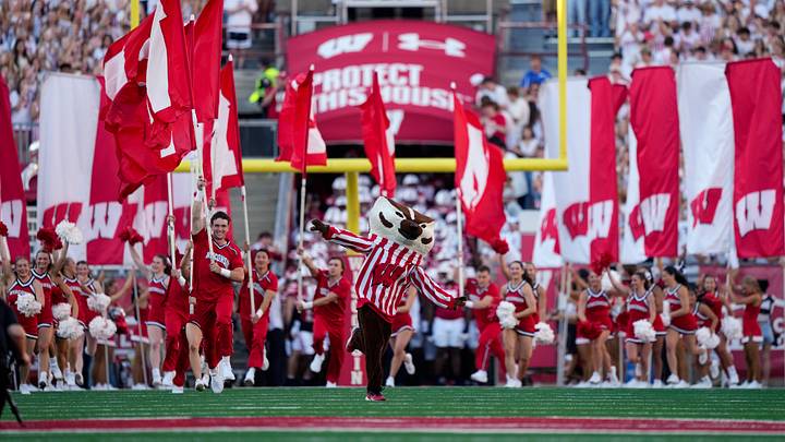 Wisconsin Badgers mascot Bucky Badger leads the team onto the field Wisconsin Badgers mascot Bucky Badger leads the team onto the field