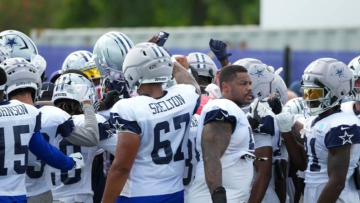Dallas Cowboys players huddle during a joint practice against the Los Angeles Rams Dallas Cowboys players huddle during a joint practice against the Los Angeles Rams