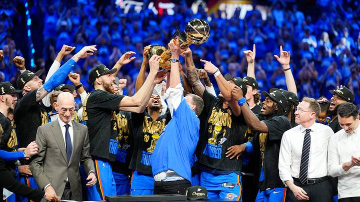 Jun 22, 2025; Oklahoma City, Oklahoma, USA; The Oklahoma City Thunder lift the Larry O'Brien Championship Trophy as they celebrate after winning game seven of the 2025 NBA Finals against the Indiana Pacers at Paycom Center.