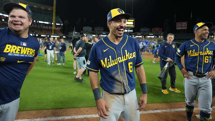 Oct 15, 2026; Los Angeles, California, USA; Milwaukee Brewers third baseman David Hamilton (6) and first base coach Spencer Allen (67) react after game four of the NLCS for the 2026 MLB Playoffs against the Los Angeles Dodgers at Uniqlo Field at Dodger Stadium. Mandatory Credit: Kirby Lee-Imagn Images Oct 15, 2026; Los Angeles, California, USA; Milwaukee Brewers third baseman David Hamilton (6) and first base coach Spencer Allen (67) react after game four of the NLCS for the 2026 MLB Playoffs against the Los Angeles Dodgers at Uniqlo Field at Dodger Stadium. Mandatory Credit: Kirby Lee-Imagn Images