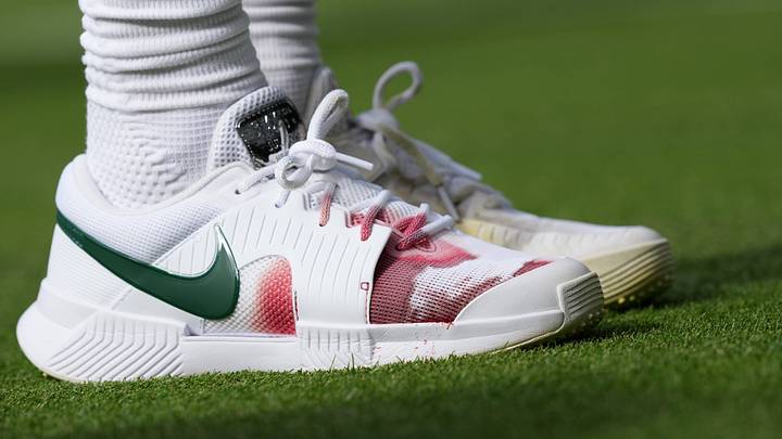 Jannik Sinner's right tennis shoe filled with blood during his match at Wimbledon.