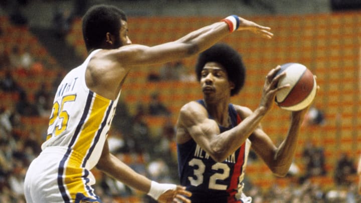 Unknown date; Indianapolis, IN, USA: FILE PHOTO; New York Nets forward Julius Erving (32) is guarded by Indiana Pacers guard Billy Knight (25) at Market Square Arena. Mandatory Credit: Malcolm Emmons-Imagn Images Unknown date; Indianapolis, IN, USA: FILE PHOTO; New York Nets forward Julius Erving (32) is guarded by Indiana Pacers guard Billy Knight (25) at Market Square Arena. Mandatory Credit: Malcolm Emmons-Imagn Images