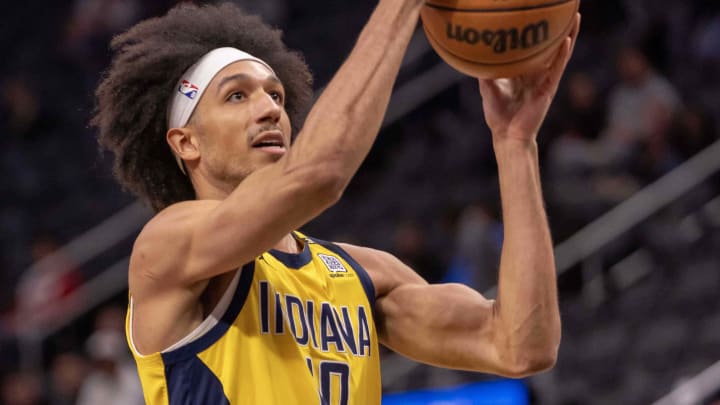 Mar 20, 2024; Detroit, Michigan, USA; Indiana Pacers guard Kendall Brown (10) drives to the basket for two points against the Detroit Pistons in the second half at Little Caesars Arena. Mandatory Credit: David Reginek-USA TODAY Sports