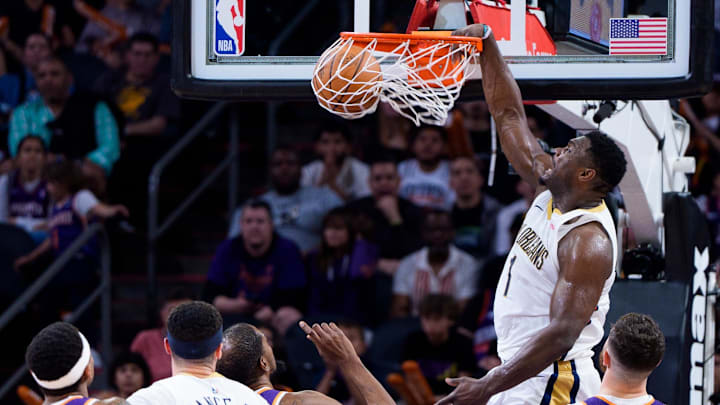 Apr 7, 2024; Phoenix, Arizona, USA;  New Orleans Pelicans forward Zion Williamson (1) dunks to score