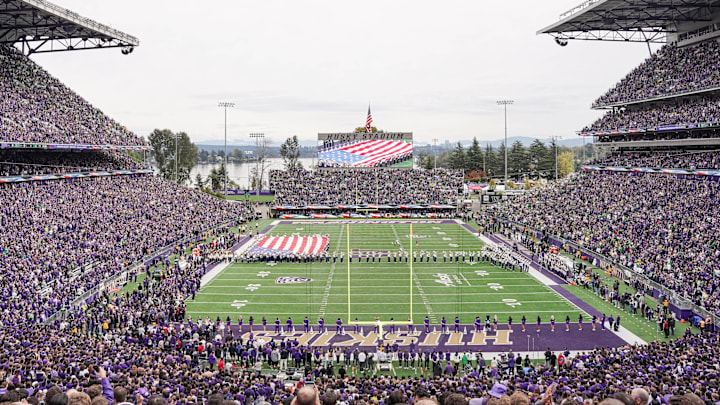 Husky Stadium is shown at full capacity for the national anthem.