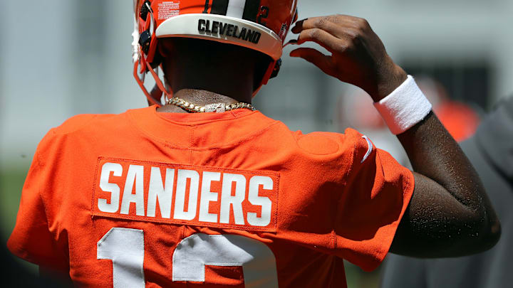 Cleveland Browns quarterback Shedeur Sanders (12) heads on to the field during day two of NFL rookie minicamp at the Cleveland Browns training facility on Saturday, May 10, 2025, in Berea, Ohio.