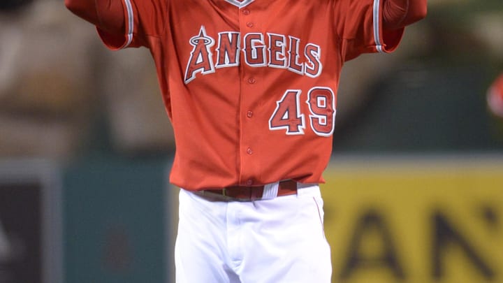 Jun 9, 2014; Anaheim, CA, USA; Los Angeles Angels reliever Ernesto Frieri (49) celebrates at the end