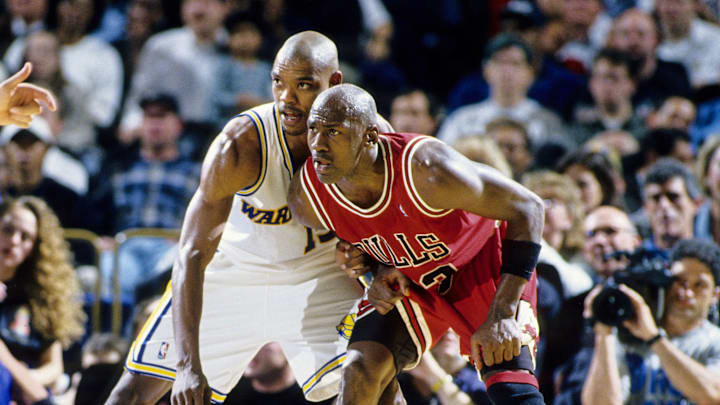Unknown date, 1996; Oakland, CA; USA; FILE PHOTO; Chicago Bulls guard Michael Jordan (23) in action against  Golden State Warriors forward Latrell Sprewell (15) at the Oakland Coliseum.
