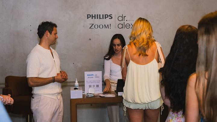 Dr. Alex and staff during SI Swimsuit Social Club