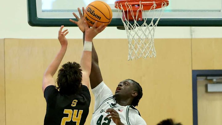 De La Salle's Davis Balogun (42) swats a story earlier this season against Serra. The 6-6, 225-pound forward had 25 points and 12 rebounds Saturday in a 74-44 EBAL championship playoff game final. 