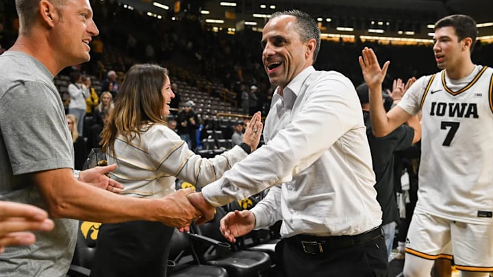 Iowa Hawkeyes head coach Ben McCollum