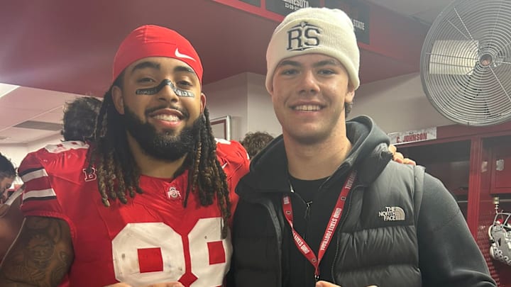 Lincoln Watkins with Ohio State tight end Gee Scott. Lincoln Watkins with Ohio State tight end Gee Scott.
