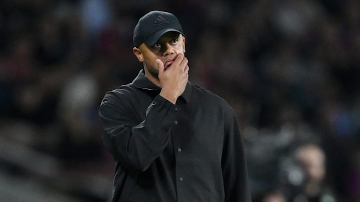 Dejected Vincent Kompany on the sideline during Bayern Munich's 4-1 defeat against FC Barcelona in the Champions League on Wednesday.