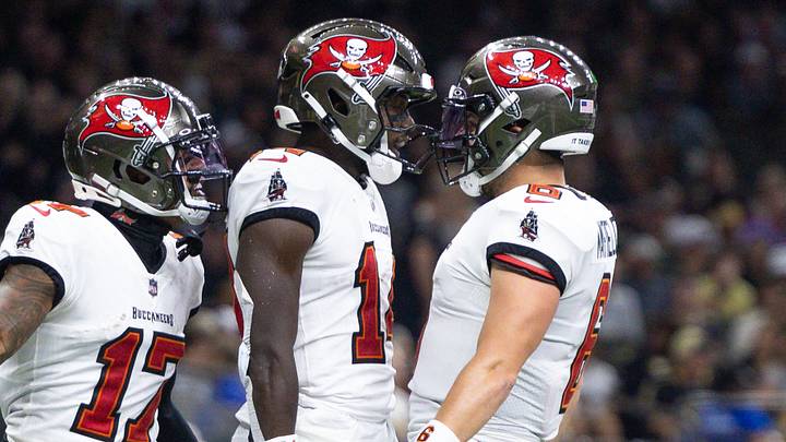 Oct 13, 2024; New Orleans, Louisiana, USA; Tampa Bay Buccaneers wide receiver Chris Godwin (14) and quarterback Baker Mayfield (6) celebrate a touchdown against the New Orleans Saints during he first half at Caesars Superdome. Mandatory Credit: Stephen Lew-Imagn Imagesd Oct 13, 2024; New Orleans, Louisiana, USA; Tampa Bay Buccaneers wide receiver Chris Godwin (14) and quarterback Baker Mayfield (6) celebrate a touchdown against the New Orleans Saints during he first half at Caesars Superdome. Mandatory Credit: Stephen Lew-Imagn Imagesd