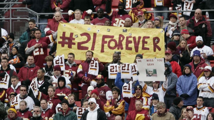 Dec 2, 2007; Landover, MD, USA; Washington Redskins fans hold up a sign dedicated to Washington Redskins safety Sean Taylor during the game against the Buffalo Bills at FedEx Field in Landover, MD. Taylor died on 11/27/07 from a gunshot wound he suffered during a burglary attempt of his home the day before. Mandatory Credit: James Lang USA TODAY Sports Dec 2, 2007; Landover, MD, USA; Washington Redskins fans hold up a sign dedicated to Washington Redskins safety Sean Taylor during the game against the Buffalo Bills at FedEx Field in Landover, MD. Taylor died on 11/27/07 from a gunshot wound he suffered during a burglary attempt of his home the day before. Mandatory Credit: James Lang USA TODAY Sports
