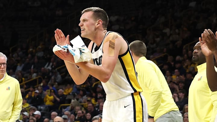 Jan 24, 2025; Iowa City, Iowa, USA; Iowa Hawkeyes forward Payton Sandfort (20) cheers his teammates in their game against the Penn State Nittany Lions during the first half at Carver-Hawkeye Arena. Jan 24, 2025; Iowa City, Iowa, USA; Iowa Hawkeyes forward Payton Sandfort (20) cheers his teammates in their game against the Penn State Nittany Lions during the first half at Carver-Hawkeye Arena.