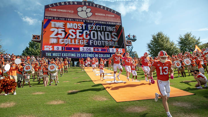 The Clemson football team runs down the hill, dubbed as the most exciting 25 seconds in college football, before the game against Syracuse in Clemson, South Carolina, Saturday, Oct 24, 2020.