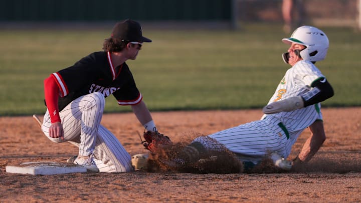 Shallowater's Brayden Gurney tags out Idalou's Colt Gandy during a District 2-3A baseball game, Tuesday, April 15, 2025, at the Idalou ISD Baseball Complex.