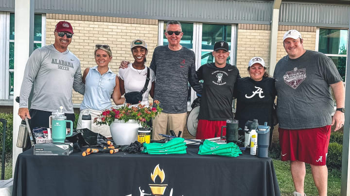 Alabama Athletics Staff participates in community service. 