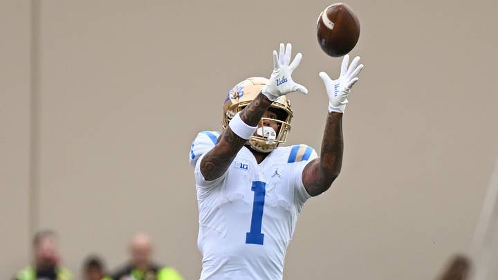 Oct 25, 2025; Bloomington, Indiana, USA; UCLA Bruins wide receiver Rico Flores Jr. (1) catches a pass along the sideline during the second half against the Indiana Hoosiers at Memorial Stadium. Mandatory Credit: Robert Goddin-Imagn Images Oct 25, 2025; Bloomington, Indiana, USA; UCLA Bruins wide receiver Rico Flores Jr. (1) catches a pass along the sideline during the second half against the Indiana Hoosiers at Memorial Stadium. Mandatory Credit: Robert Goddin-Imagn Images