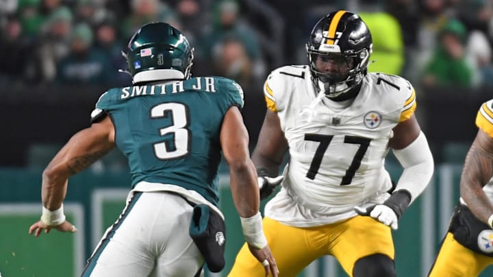 Dec 15, 2024; Philadelphia, Pennsylvania, USA; Pittsburgh Steelers offensive tackle Broderick Jones (77) blocks Philadelphia Eagles linebacker Nolan Smith Jr. (3) at Lincoln Financial Field. Mandatory Credit: Eric Hartline-Imagn Images