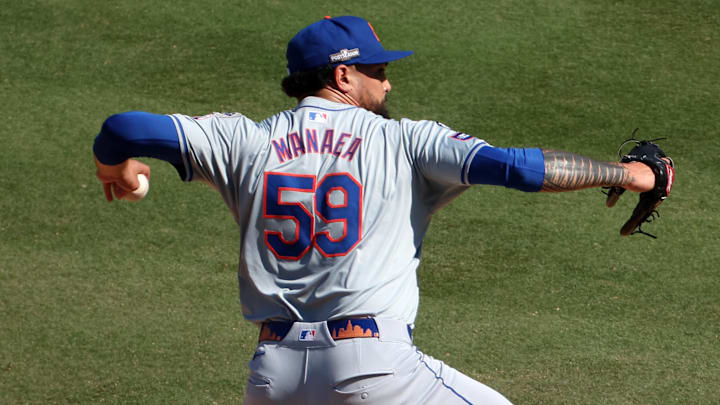 Oct 14, 2024; Los Angeles, California, USA; New York Mets pitcher Sean Manaea (59) throws a pitch in the first inning during game two of the NLCS for the 2024 MLB Playoffs at Dodger Stadium. 