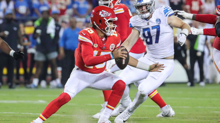 Detroit Lions defensive end Aidan Hutchinson (97) looks to tackle Kansas City Chiefs quarterback Patrick Mahomes (15) during the second half at Arrowhead Stadium in Kansas City, Mo. on Thursday, Sept. 7, 2023.