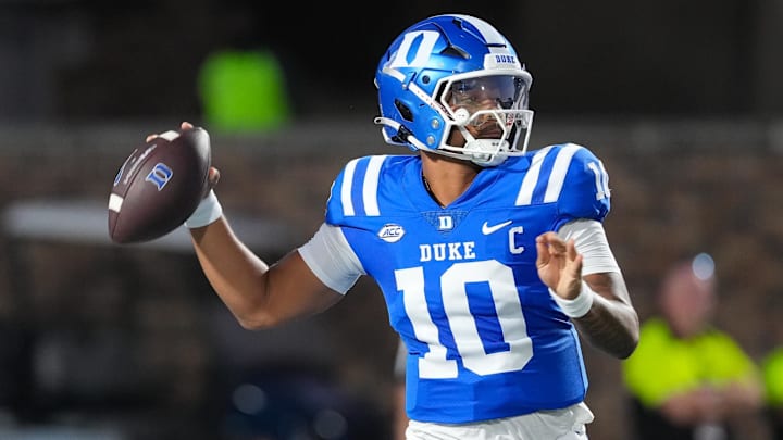 Aug 28, 2025; Durham, North Carolina, USA;  Duke Blue Devils quarterback Darian Mensah (10) goes to throw the ball against the Elon Phoenix during the first half at Wallace Wade Stadium. Mandatory Credit: James Guillory-Imagn Images