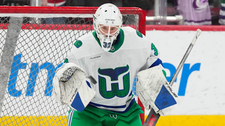 Jan 29, 2026; Raleigh, North Carolina, USA;  Carolina Hurricanes goaltender Brandon Bussi (32) watches the shot  during the warmups before the game against the Utah Mammoth at Lenovo Center. Mandatory Credit: James Guillory-Imagn Images