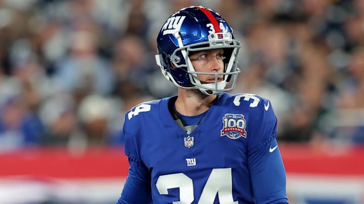 Sep 26, 2024; East Rutherford, New Jersey, USA; New York Giants place kicker Greg Joseph (34) watches his field goal against the Dallas Cowboys during the first quarter at MetLife Stadium.  