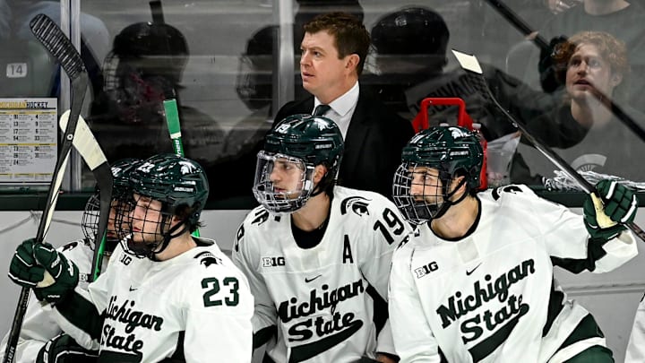 Michigan State's head coach Adam Nightingale, top center, and players, from left, Reed Lebster, Nicolas M ller and Jeremy Davidson look on from the bench during the third period in the game against Michigan on Friday, Jan. 19, 2024, at Munn Arena in East Lansing. Michigan State's head coach Adam Nightingale, top center, and players, from left, Reed Lebster, Nicolas M ller and Jeremy Davidson look on from the bench during the third period in the game against Michigan on Friday, Jan. 19, 2024, at Munn Arena in East Lansing.