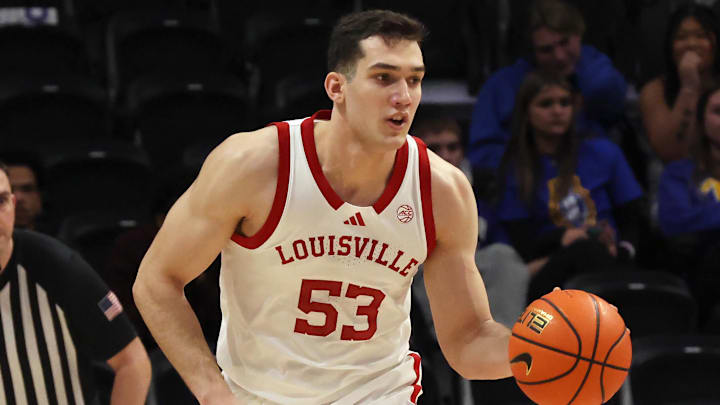 Jan 17, 2026; Pittsburgh, Pennsylvania, USA; Louisville Cardinals forward Vangelis Zougris (53) brings the ball up court against the Pittsburgh Panthers during the second half at the Petersen Events Center. Mandatory Credit: Charles LeClaire-Imagn Images