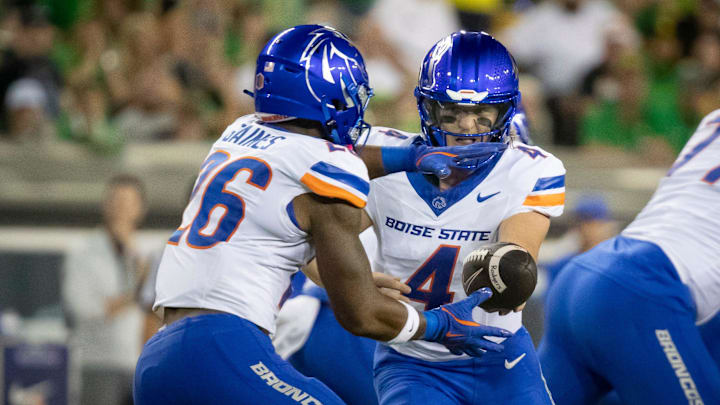 Boise State quarterback Maddux Madsen hands the ball off to Boise State running back Sire Gaines as the Oregon Ducks host the Boise State Broncos Saturday, Sept. 7, 2024 at Autzen Stadium in Eugene, Ore.